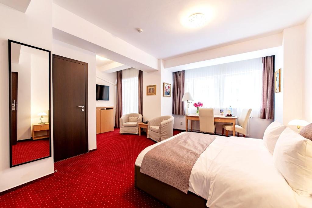 Postel nebo postele na pokoji v ubytování Bucur Accommodation