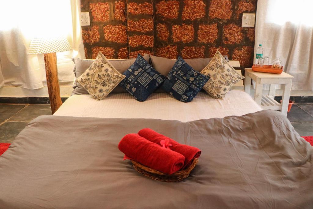 Postel nebo postele na pokoji v ubytování Namaste Jungle - A Boutique Homestay