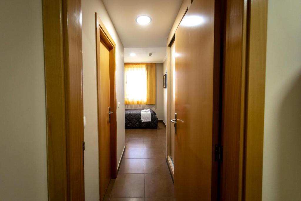 Postel nebo postele na pokoji v ubytování Hostal Campestre