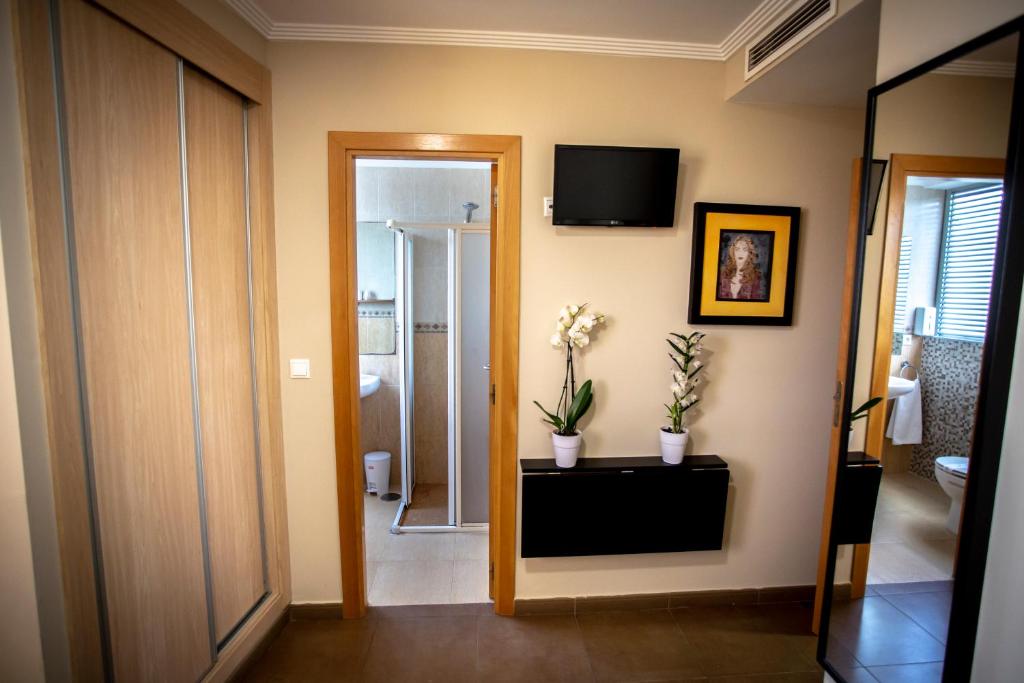 TV a/nebo společenská místnost v ubytování Hostal Campestre