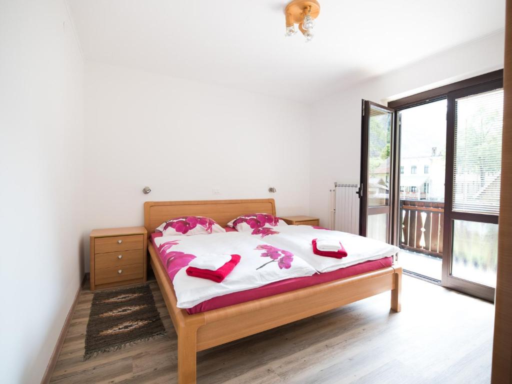Postel nebo postele na pokoji v ubytování Apartments and rooms Nataša 2