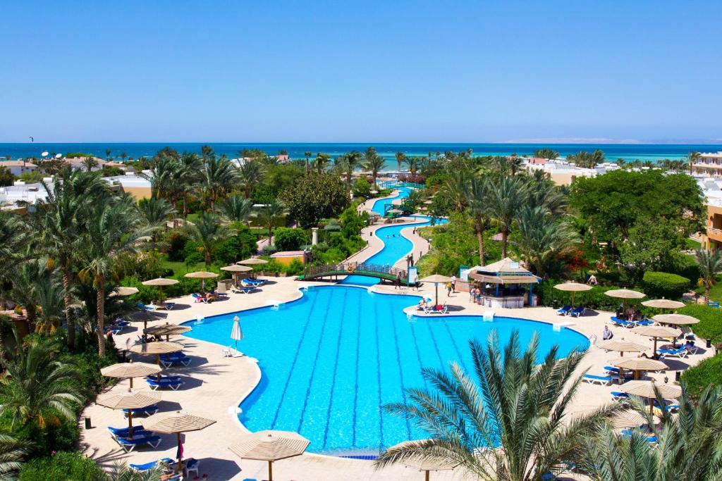 an aerial view of the pool at the resort at Golden Beach Resort in Hurghada