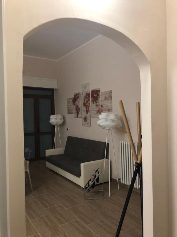A bed or beds in a room at Holidays Lecce