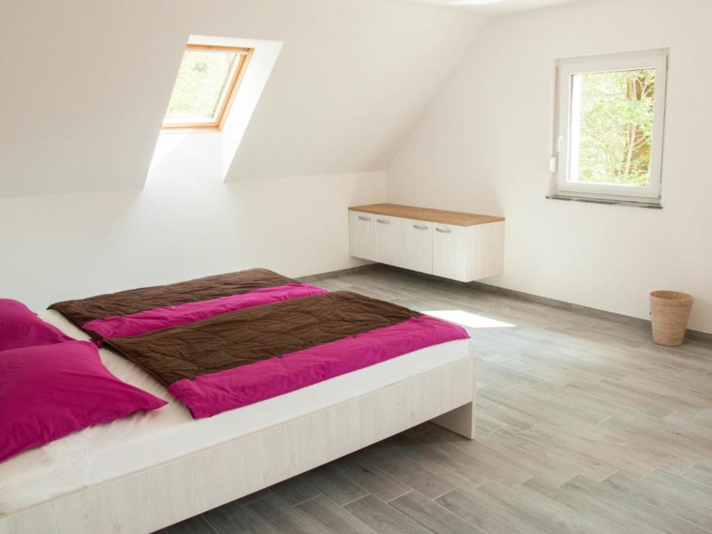 Postel nebo postele na pokoji v ubytování Apartments and rooms Nataša 1
