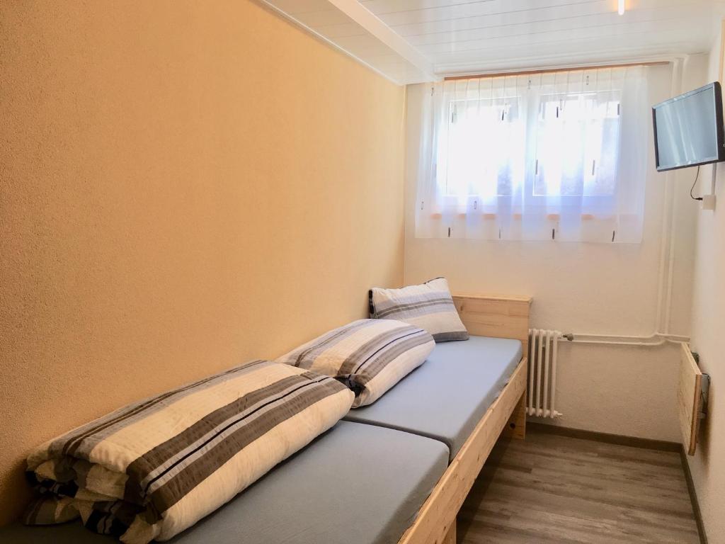 Postel nebo postele na pokoji v ubytování Pensiun Lischana
