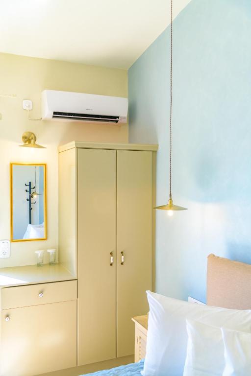 Posteľ alebo postele v izbe v ubytovaní Panas Hotel