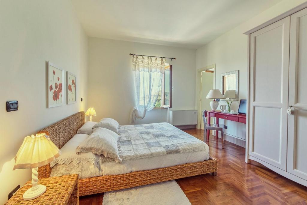 Postel nebo postele na pokoji v ubytování B&B Daria - Deb'S Monticchiello