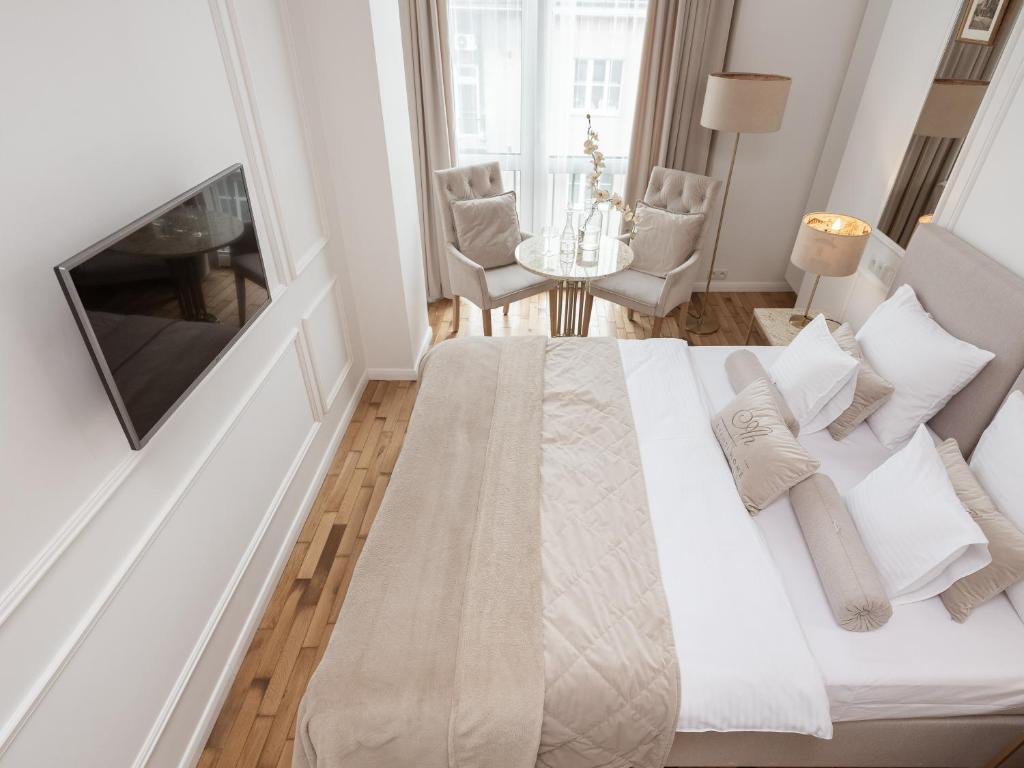 Televízia a/alebo spoločenská miestnosť v ubytovaní AVANTI Home