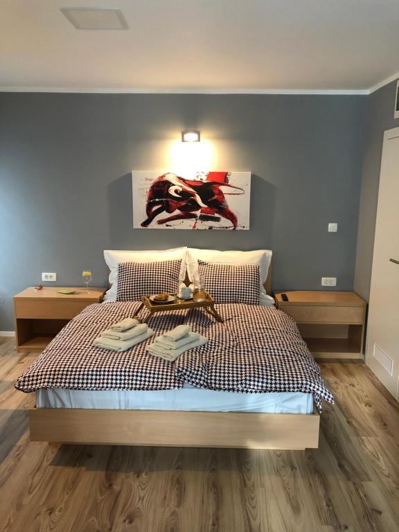 Postel nebo postele na pokoji v ubytování Apartments ViTa