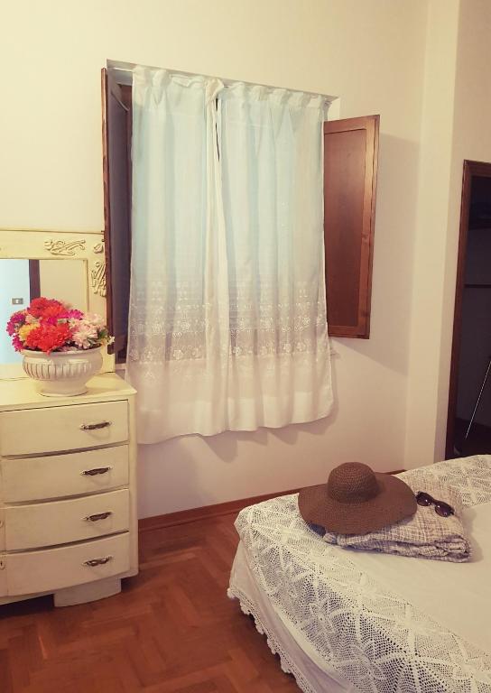 Łóżko lub łóżka w pokoju w obiekcie Palazzetto del Pittore
