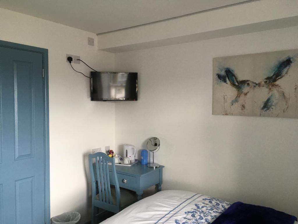 Postel nebo postele na pokoji v ubytování Lodbourne House B&B
