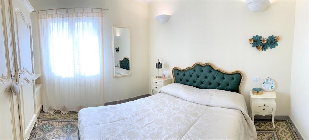 Letto o letti in una camera di B&B ALVINO