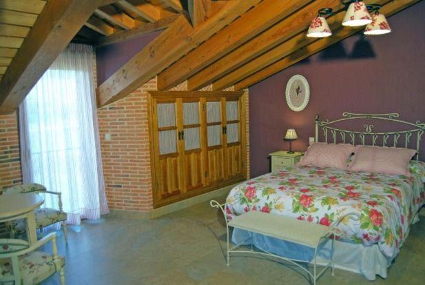 Postel nebo postele na pokoji v ubytování CASA RURAL EL PILON