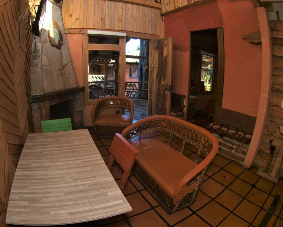 Posezení v ubytování Hotel Cabaña Los Ruiseñores