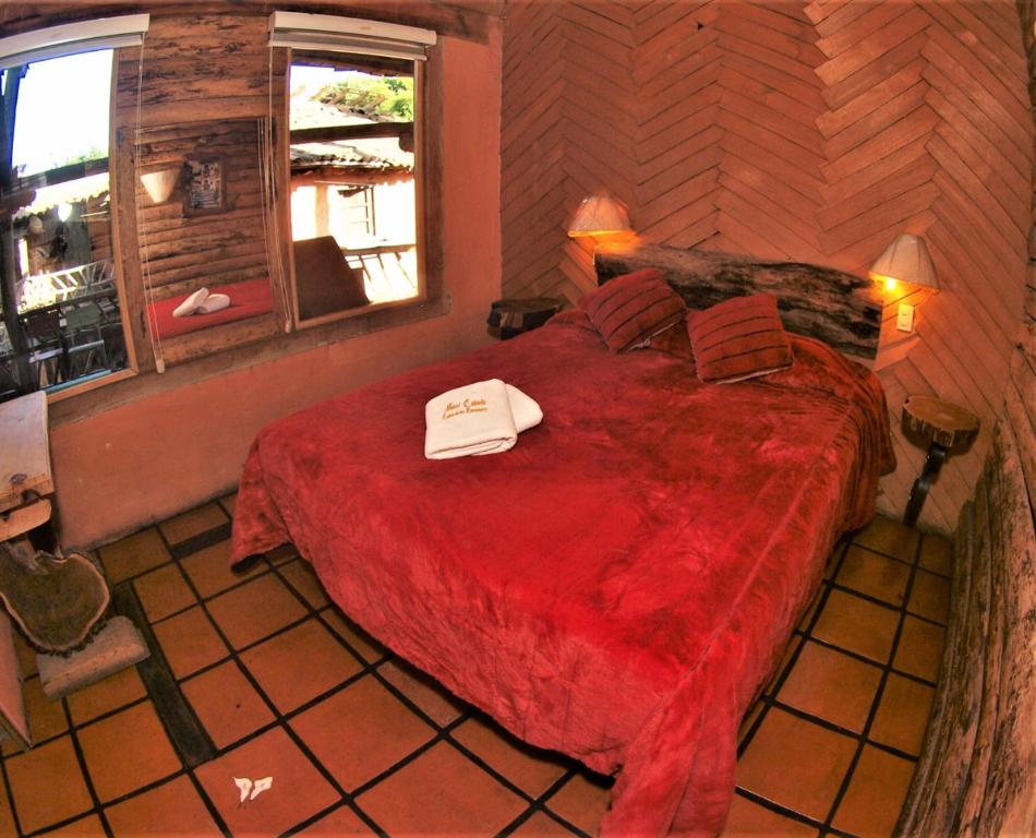 Postel nebo postele na pokoji v ubytování Hotel Cabaña Los Ruiseñores