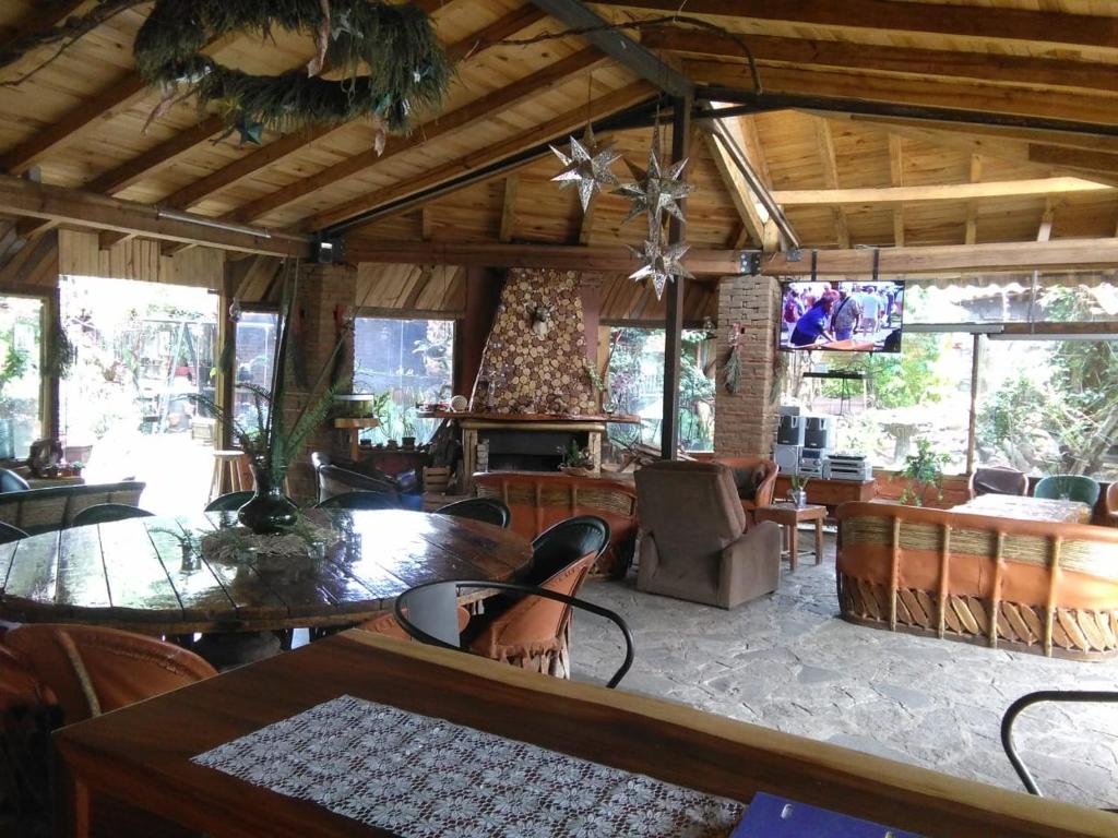 Posezení v ubytování Hotel Cabaña Los Ruiseñores