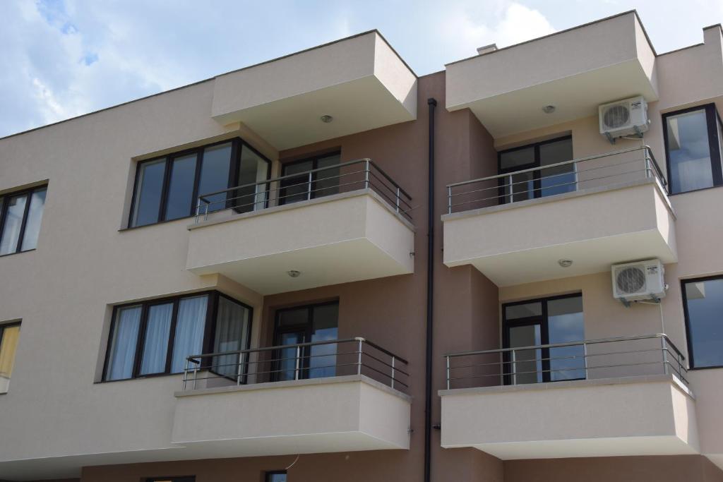 an image of an apartment building with balconies at Casa Del Mar in Primorsko