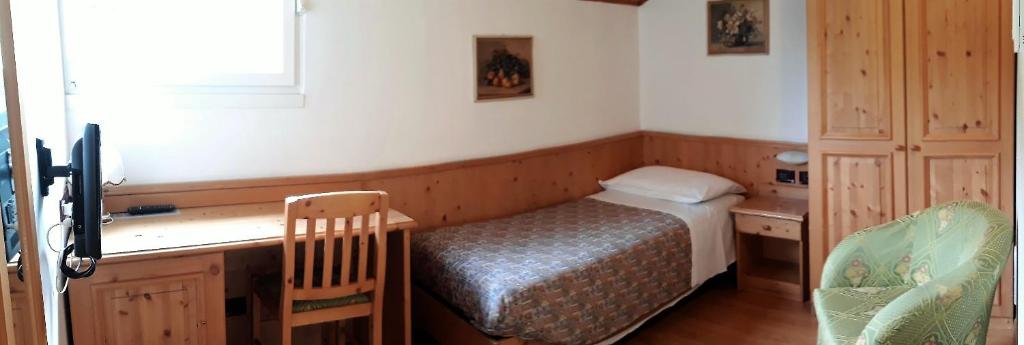 Postel nebo postele na pokoji v ubytování Hotel Karinhall