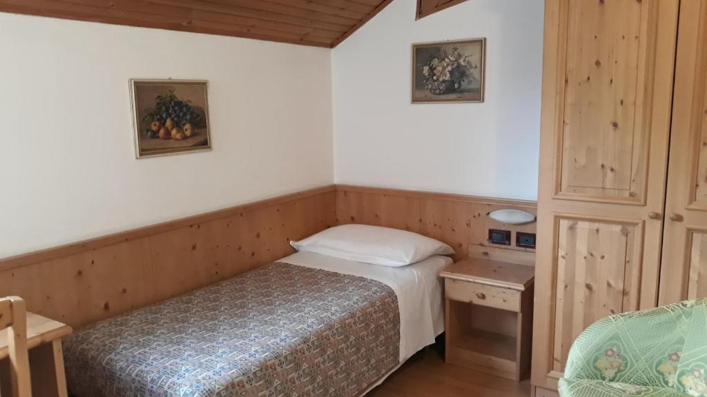 Postel nebo postele na pokoji v ubytování Hotel Karinhall