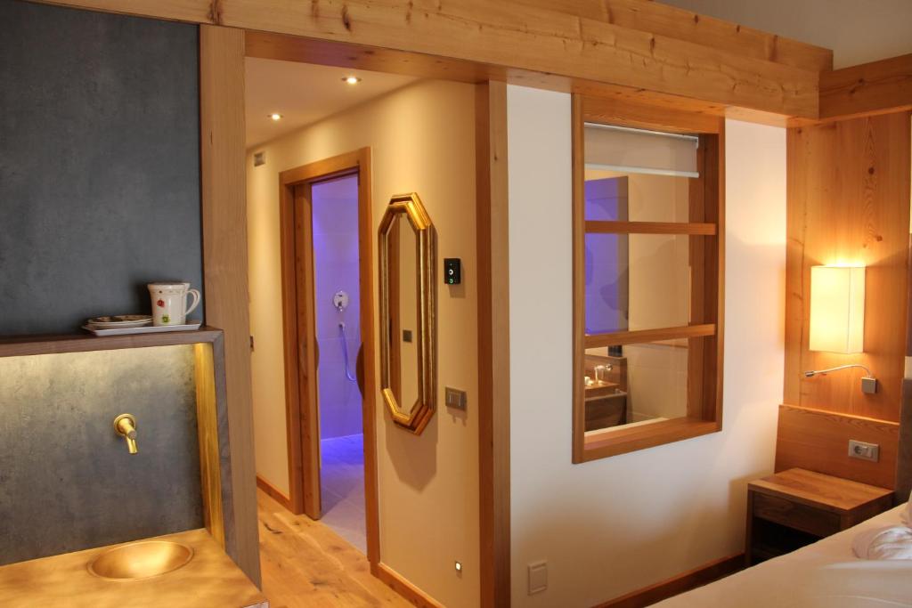 Postel nebo postele na pokoji v ubytování Hotel Emmy - five elements