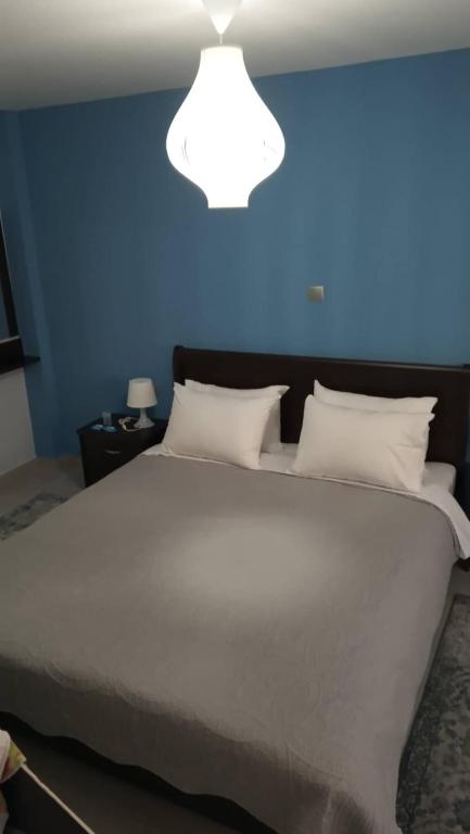 Posteľ alebo postele v izbe v ubytovaní Blue Studio