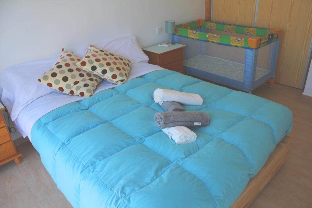 Postel nebo postele na pokoji v ubytování Aina