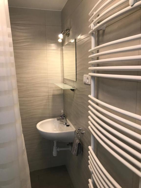 Kúpeľňa v ubytovaní Heni Apartment