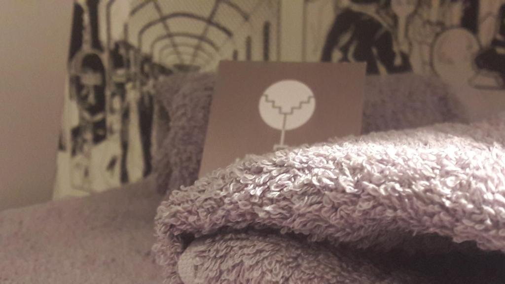A bed or beds in a room at L'albero Di Famiglia