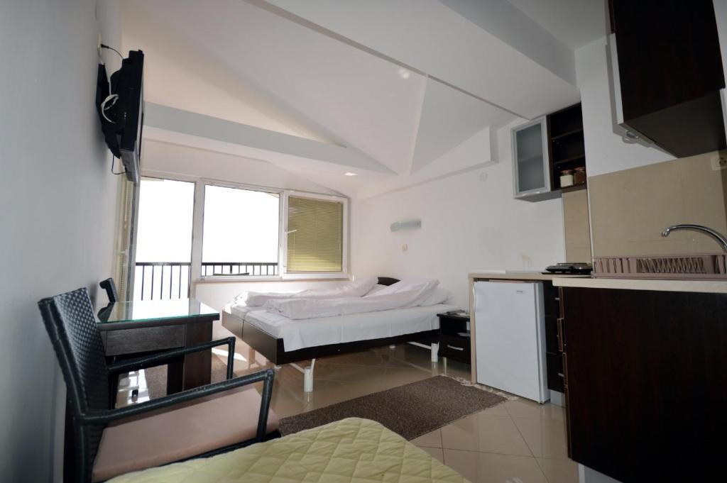 Postel nebo postele na pokoji v ubytování Topencarov Guest House