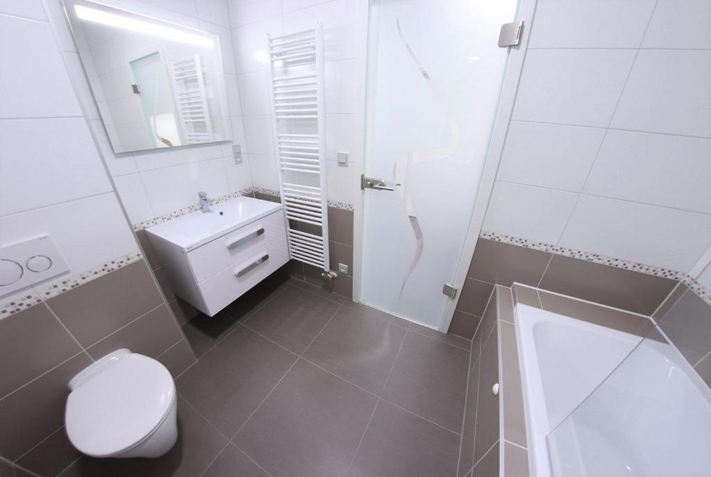 Koupelna v ubytování JM Apartments