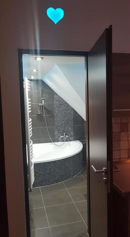 Koupelna v ubytování Sunrise Apartmanház