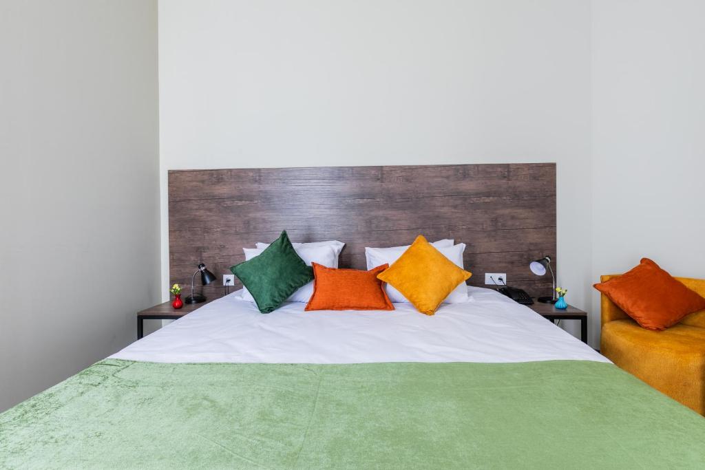 Postel nebo postele na pokoji v ubytování Boutique Hotel MOJO