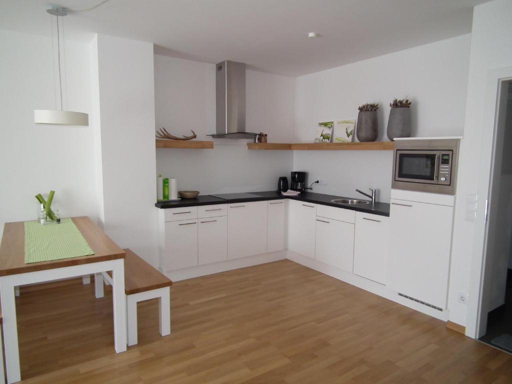 Kuchyň nebo kuchyňský kout v ubytování Nassfeld Apartments - "Traditionell anders"