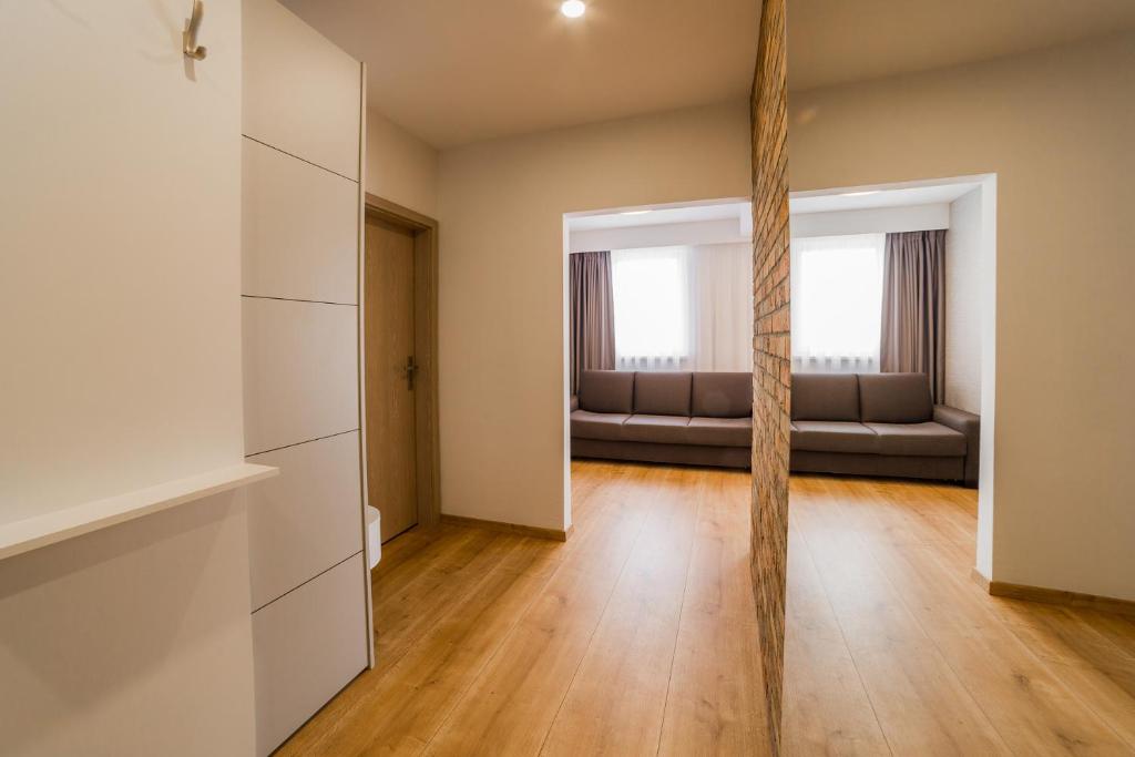 Postel nebo postele na pokoji v ubytování Apartment Dolfi, Senec
