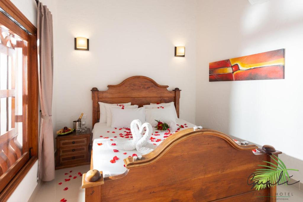 Postel nebo postele na pokoji v ubytování Finca Hotel Guali Santafe