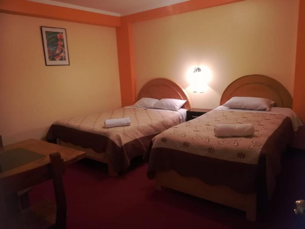 Voodi või voodid majutusasutuse HOSTAL MILAGROS INN - samary inn toas