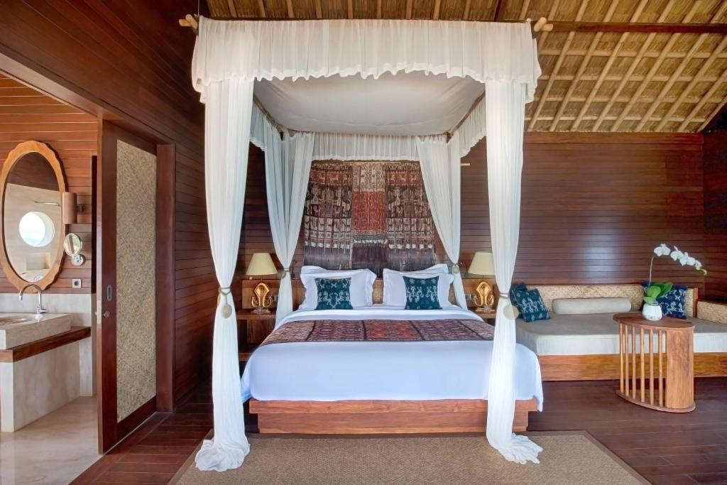 Postel nebo postele na pokoji v ubytování Lelewatu Resort Sumba