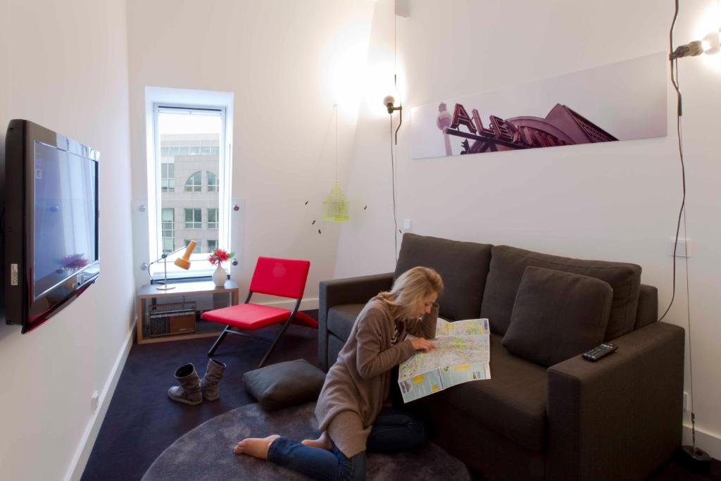 TV a/nebo společenská místnost v ubytování Hotel Gat Point Charlie