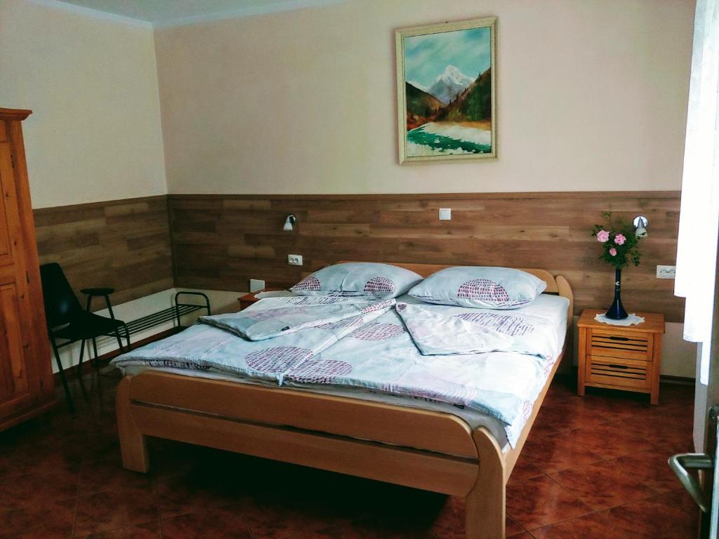 Postel nebo postele na pokoji v ubytování Sobe Bača
