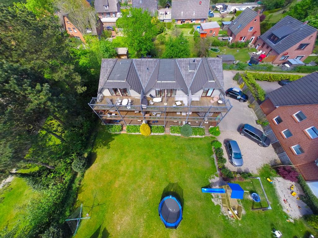 an aerial view of a house with a roof at Ferienwohnung Wieben in Sankt Peter-Ording