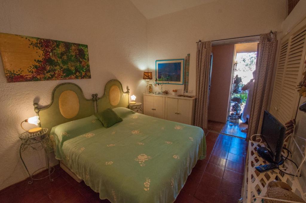 Postel nebo postele na pokoji v ubytování Villa B2 codice IUN Q1844