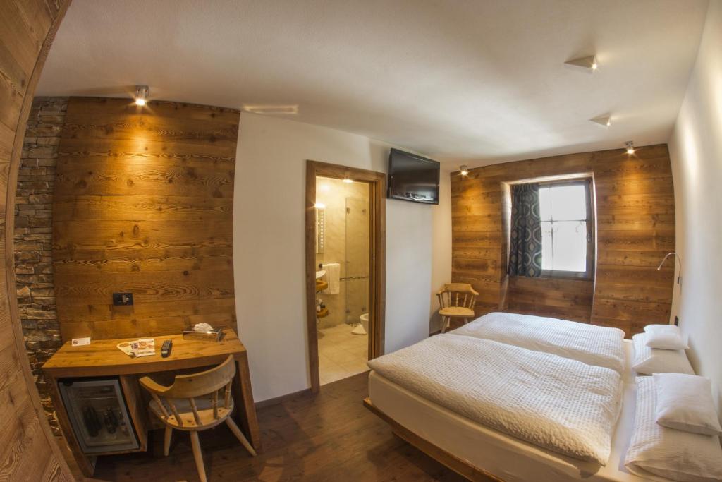 Postel nebo postele na pokoji v ubytování Bivio Hotel Plaza