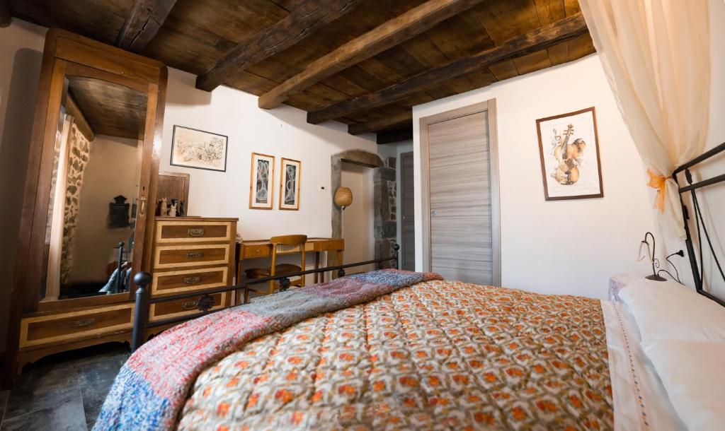 Łóżko lub łóżka w pokoju w obiekcie B&B Sopra il Portico