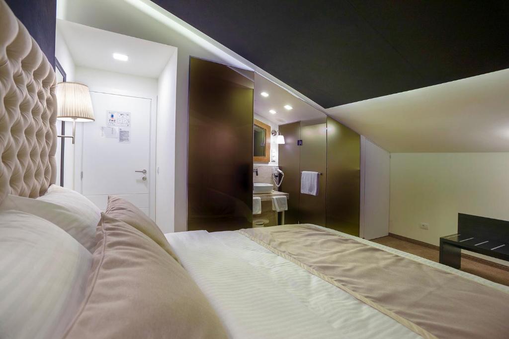 Postel nebo postele na pokoji v ubytování 4Rooms 4U