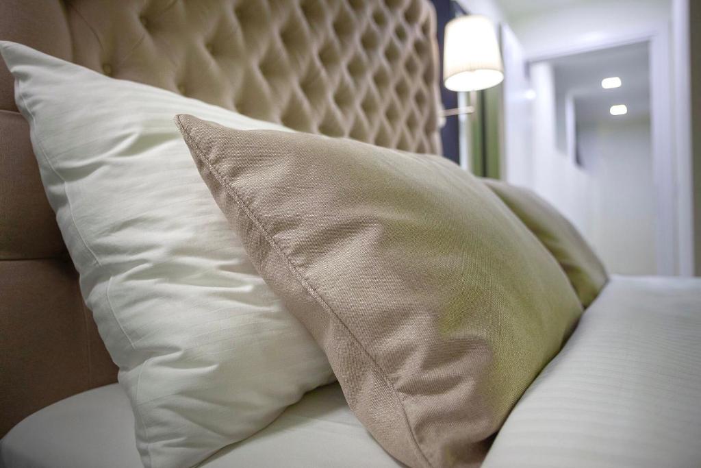 Postel nebo postele na pokoji v ubytování 4Rooms 4U