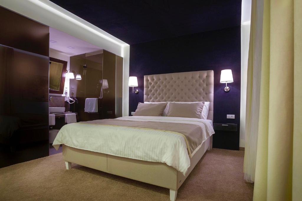 Postel nebo postele na pokoji v ubytování 4Rooms 4U