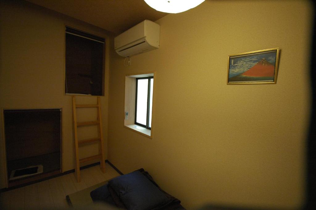 TV a/nebo společenská místnost v ubytování Chambre dhote Tatami