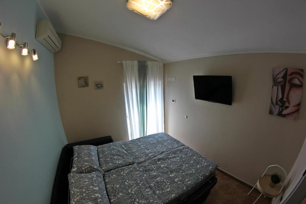 Postel nebo postele na pokoji v ubytování Room and Apartment Doris