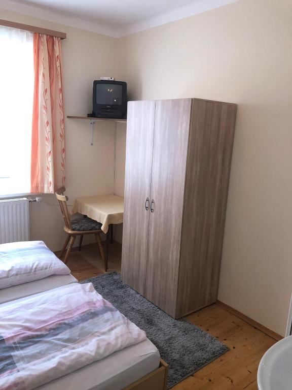 Postel nebo postele na pokoji v ubytování Gasthof-Pension Reidnwirt