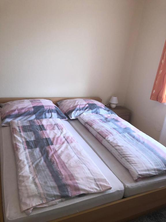Postel nebo postele na pokoji v ubytování Gasthof-Pension Reidnwirt